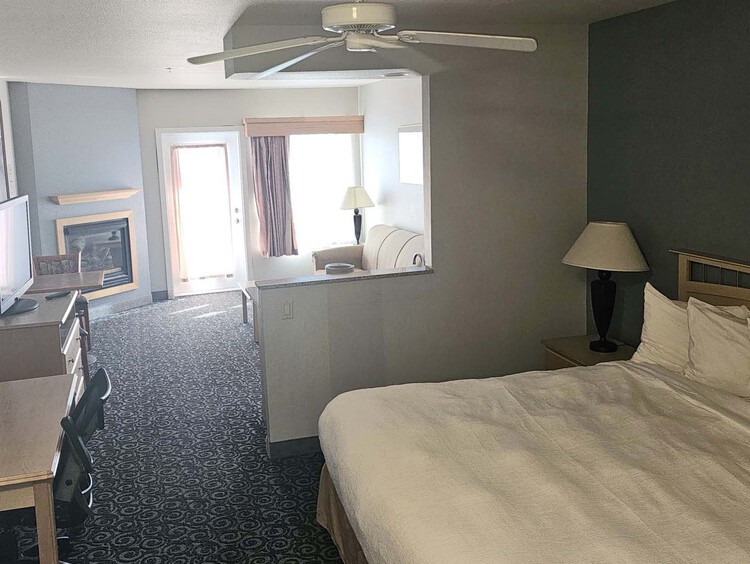 King bed with side tables and work desk