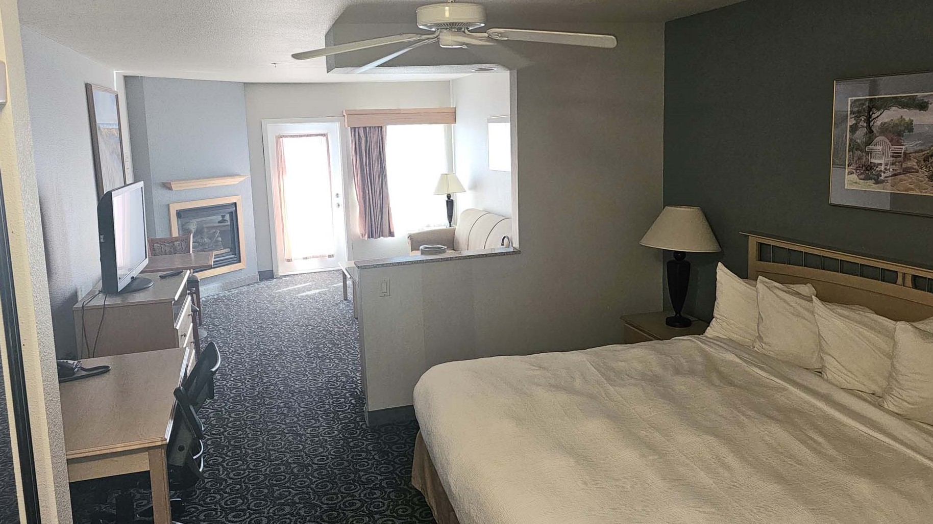 King bed with side tables and work desk